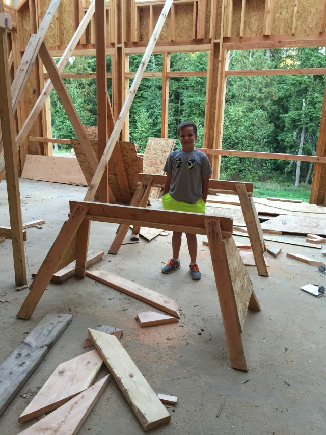 Cameron checked out the house with us this time, and liked the sawhorses!