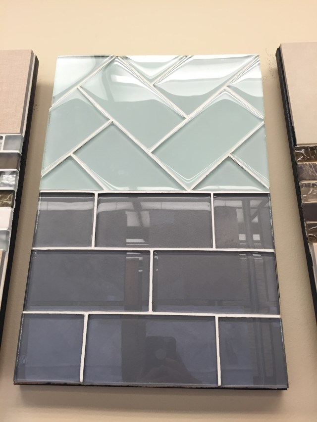 We found this arctic ice glass subway tile (the top one), that is super clean and fresh looking.
