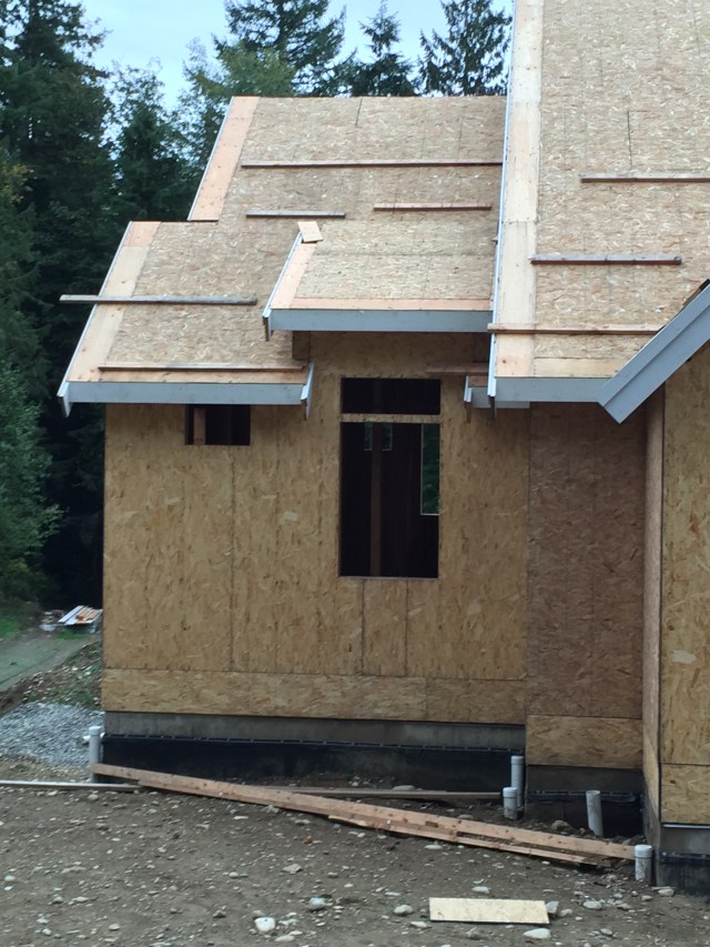 They finished the last little shed roof above the master closet this week.